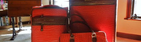 Samantha-Brown-Orange-Croco-luggage-best-luggage-to-buy