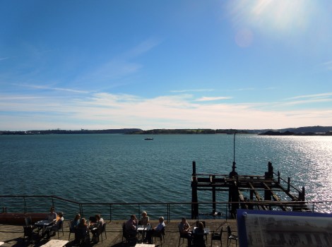 The Titanic waited for passengers to tender, just beyond the cove.