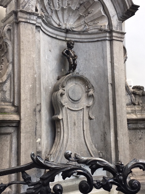 Naked Manneken Pis peeing boy